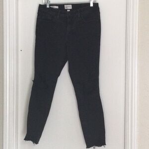 Black skinny jeans with holes